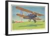 The Travel-Air Biplane-null-Framed Art Print