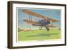 The Travel-Air Biplane-null-Framed Art Print