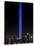 The Tribute of Light Memorial Shines into the Sky Over the Night Skyline of New York City-null-Stretched Canvas