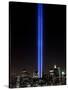 The Tribute of Light Memorial Shines into the Sky Over the Night Skyline of New York City-null-Stretched Canvas