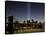 The Tribute of Light Memorial Shines into the Sky Over the Night Skyline of New York City-null-Stretched Canvas