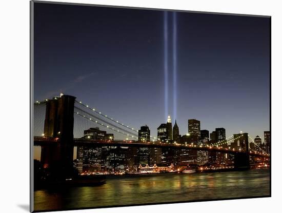 The Tribute of Light Memorial Shines into the Sky Over the Night Skyline of New York City-null-Mounted Premium Photographic Print