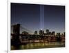 The Tribute of Light Memorial Shines into the Sky Over the Night Skyline of New York City-null-Framed Photographic Print