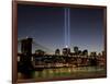 The Tribute of Light Memorial Shines into the Sky Over the Night Skyline of New York City-null-Framed Photographic Print