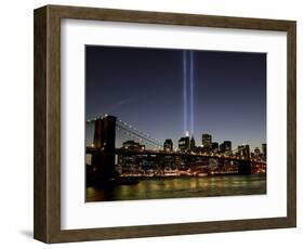 The Tribute of Light Memorial Shines into the Sky Over the Night Skyline of New York City-null-Framed Photographic Print