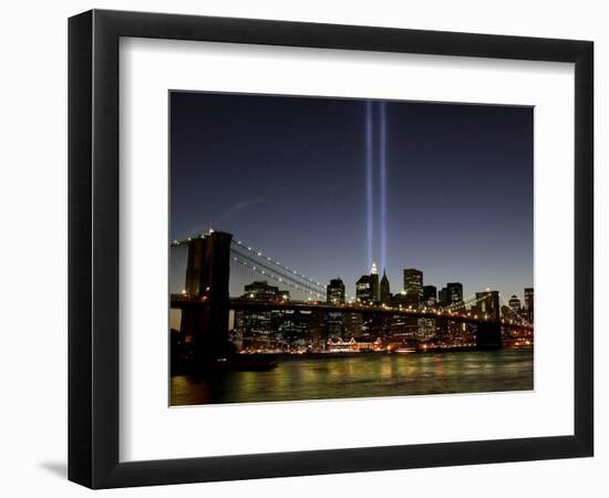 The Tribute of Light Memorial Shines into the Sky Over the Night Skyline of New York City-null-Framed Photographic Print