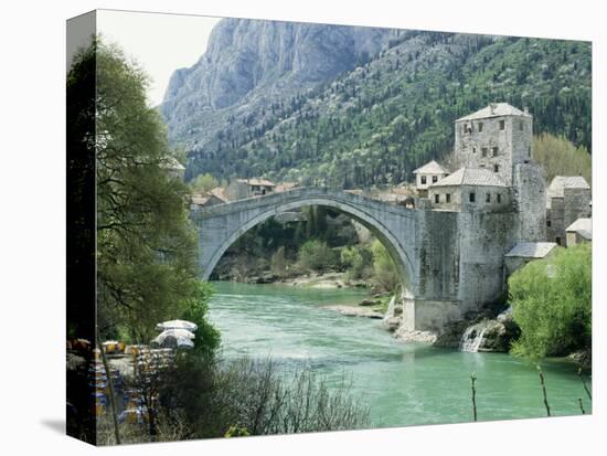 The Turkish Bridge Over the River Neretva Dividing the Town, Mostar, Bosnia, Bosnia-Herzegovina-Michael Short-Stretched Canvas