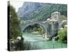 The Turkish Bridge Over the River Neretva Dividing the Town, Mostar, Bosnia, Bosnia-Herzegovina-Michael Short-Stretched Canvas