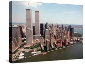 The Twin Towers of the World Trade Center Rise Above the New York Skyline-null-Stretched Canvas