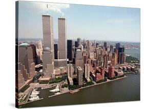 The Twin Towers of the World Trade Center Rise Above the New York Skyline-null-Stretched Canvas