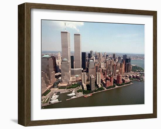 The Twin Towers of the World Trade Center Rise Above the New York Skyline-null-Framed Premium Photographic Print