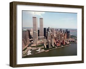 The Twin Towers of the World Trade Center Rise Above the New York Skyline-null-Framed Premium Photographic Print