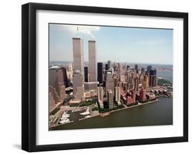 The Twin Towers of the World Trade Center Rise Above the New York Skyline-null-Framed Premium Photographic Print