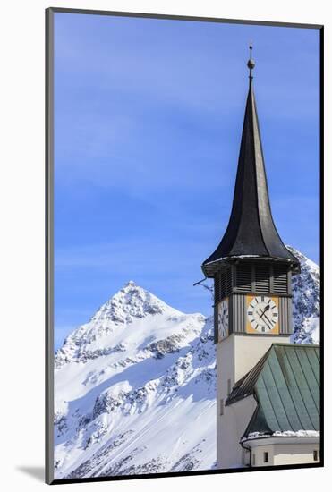 The typical alpine bell tower frames the snowy peaks, Langwies, district of Plessur, Canton of Grau-Roberto Moiola-Mounted Photographic Print