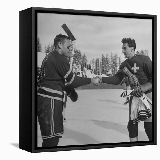 The Usa Team Giving the Swiss a Sweater and a Friendly Handshake before the Game-Mark Kauffman-Framed Stretched Canvas