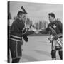 The Usa Team Giving the Swiss a Sweater and a Friendly Handshake before the Game-Mark Kauffman-Stretched Canvas