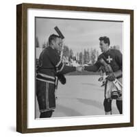 The Usa Team Giving the Swiss a Sweater and a Friendly Handshake before the Game-Mark Kauffman-Framed Premium Photographic Print