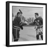 The Usa Team Giving the Swiss a Sweater and a Friendly Handshake before the Game-Mark Kauffman-Framed Premium Photographic Print