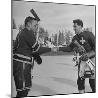 The Usa Team Giving the Swiss a Sweater and a Friendly Handshake before the Game-Mark Kauffman-Mounted Premium Photographic Print