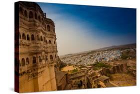 The View from the Main Courtyard of Mehrangarh Fort Towering over the Blue Rooftops in Jodhpur-Laura Grier-Stretched Canvas