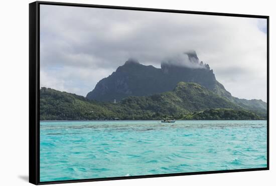 The volcanic rock in the turquoise lagoon of Bora Bora, Society Islands, French Polynesia, Pacific-Michael Runkel-Framed Stretched Canvas