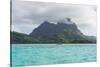 The volcanic rock in the turquoise lagoon of Bora Bora, Society Islands, French Polynesia, Pacific-Michael Runkel-Stretched Canvas