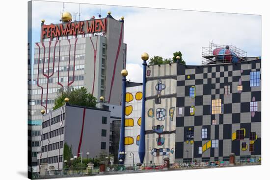 The waste incineration plant of Spittelau designed by Friedensreich Hundertwasser, Vienna, Austria-Carlo Morucchio-Stretched Canvas