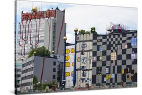 The waste incineration plant of Spittelau designed by Friedensreich Hundertwasser, Vienna, Austria-Carlo Morucchio-Stretched Canvas