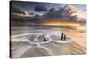 The Waves and Caribbean Sunset Frames Tree Trunks on Ffryes Beach, Antigua, Antigua and Barbuda-Roberto Moiola-Stretched Canvas