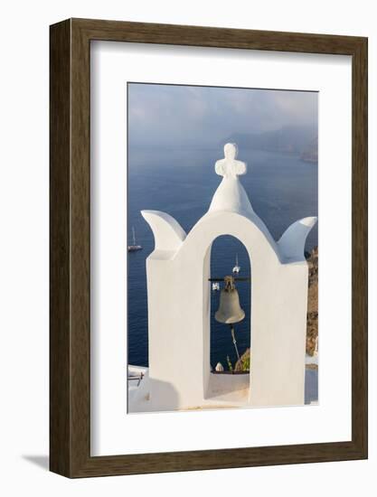 The White Steeple of the Church and the Blue Aegean Sea as Symbols of Greece, Oia, Santorini-Roberto Moiola-Framed Photographic Print