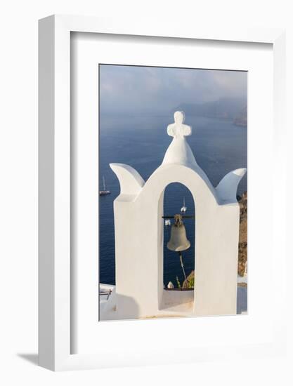 The White Steeple of the Church and the Blue Aegean Sea as Symbols of Greece, Oia, Santorini-Roberto Moiola-Framed Photographic Print