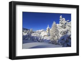 The winter sun illuminate the snowy landscape and the typical church Maloja Canton of Engadine Swit-ClickAlps-Framed Photographic Print