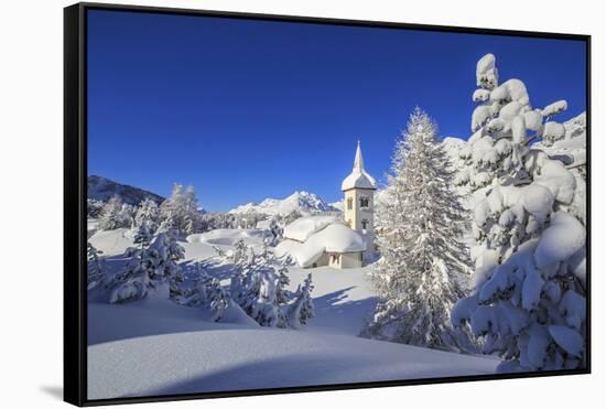 The winter sun illuminate the snowy landscape and the typical church Maloja Canton of Engadine Swit-ClickAlps-Framed Stretched Canvas