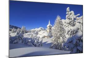 The winter sun illuminate the snowy landscape and the typical church Maloja Canton of Engadine Swit-ClickAlps-Mounted Photographic Print