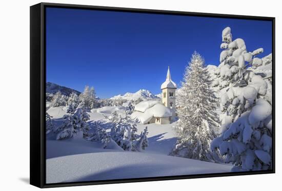 The winter sun illuminate the snowy landscape and the typical church Maloja Canton of Engadine Swit-ClickAlps-Framed Stretched Canvas