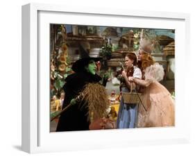 The Wizard of Oz, Margaret Hamilton, Judy Garland, Billie Burke, 1939-null-Framed Premium Photographic Print