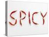 The Word 'SPICY' Written in Red Chillies-Peter Rees-Stretched Canvas