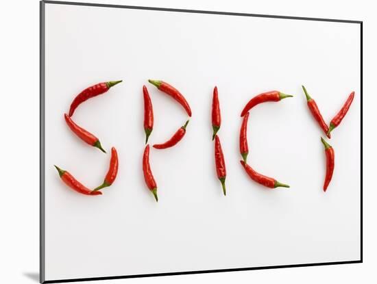 The Word 'SPICY' Written in Red Chillies-Peter Rees-Mounted Photographic Print