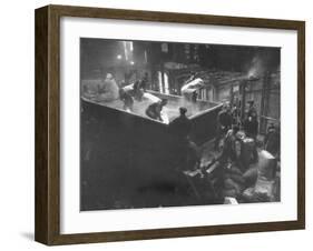 The Workmen Quickly Covering the Ingot with Vermiculite-Ralph Morse-Framed Photographic Print