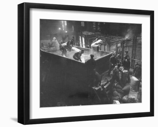 The Workmen Quickly Covering the Ingot with Vermiculite-Ralph Morse-Framed Photographic Print