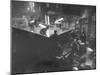 The Workmen Quickly Covering the Ingot with Vermiculite-Ralph Morse-Mounted Photographic Print