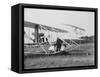 The Wright Brothers put a plane on the launch rail for the first Army flight at Fort Myer-Harris & Ewing-Framed Stretched Canvas