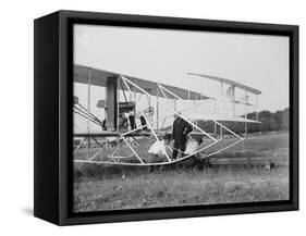 The Wright Brothers put a plane on the launch rail for the first Army flight at Fort Myer-Harris & Ewing-Framed Stretched Canvas