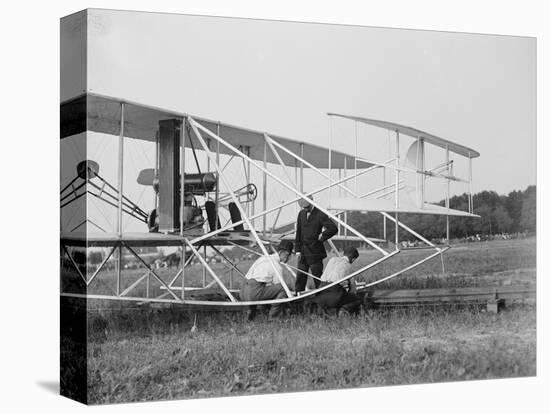 The Wright Brothers put a plane on the launch rail for the first Army flight at Fort Myer-Harris & Ewing-Stretched Canvas