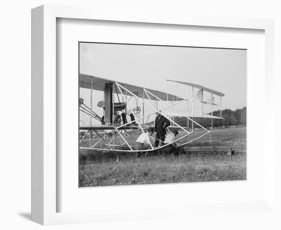 The Wright Brothers put a plane on the launch rail for the first Army flight at Fort Myer-Harris & Ewing-Framed Photographic Print