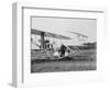 The Wright Brothers put a plane on the launch rail for the first Army flight at Fort Myer-Harris & Ewing-Framed Photographic Print