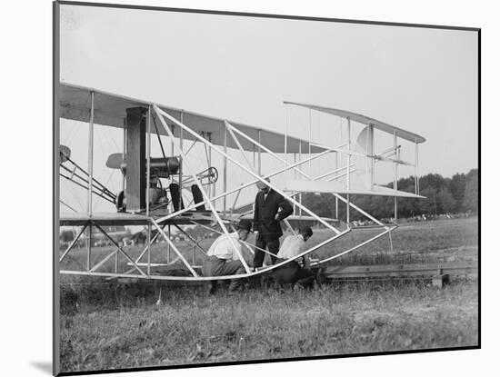 The Wright Brothers put a plane on the launch rail for the first Army flight at Fort Myer-Harris & Ewing-Mounted Photographic Print