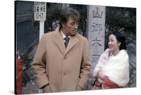 THE YAKUZA by SydneyPollack with Robert Mitchum and Kishi Keiko, 1974 (photo)-null-Stretched Canvas