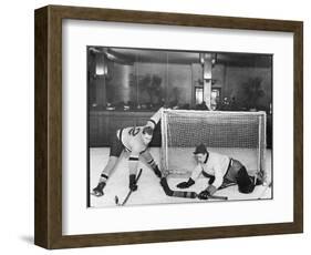 There's a Goal Mouth Scramble During This Game of Ice Hockey-null-Framed Photographic Print