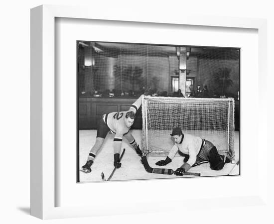 There's a Goal Mouth Scramble During This Game of Ice Hockey-null-Framed Photographic Print